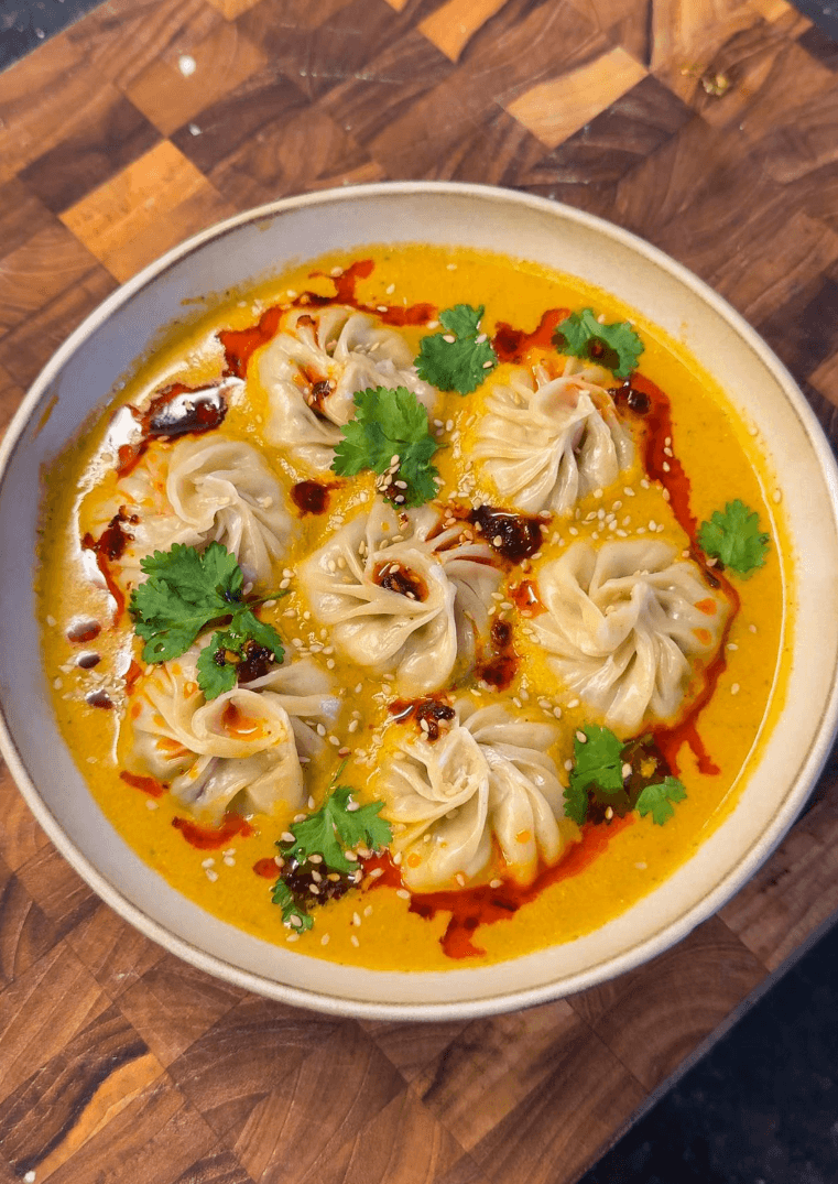 Jhol Chicken Momo (Nepalese Steamed Dumpling in a Spiced Sesame Tomato Broth)