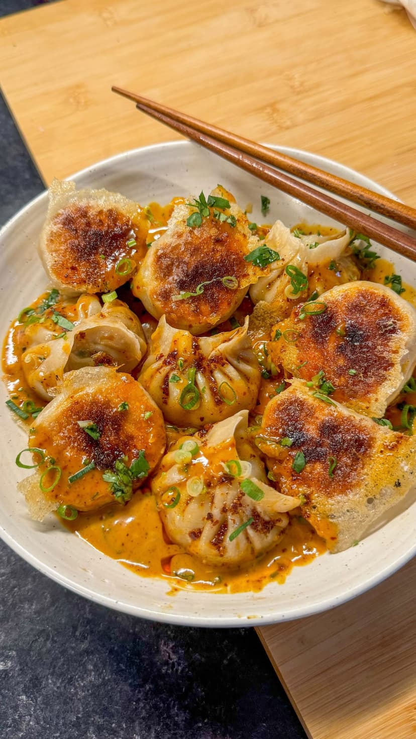 Crispy Pork and Prawn Dumplings In A Curry Satay Sauce